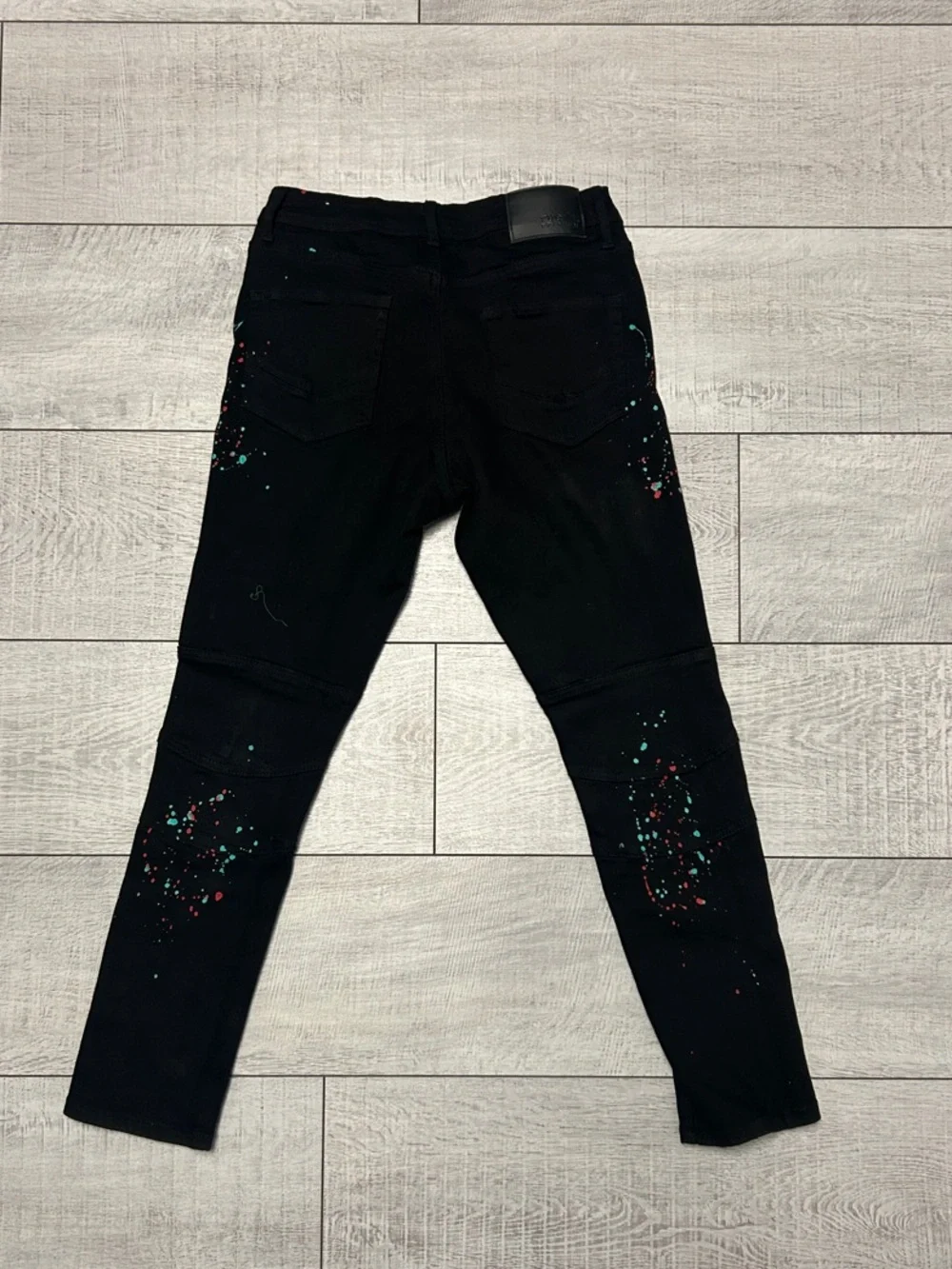 Rue21 Black Distressed Jeans with Red and Teal Paint Splatter